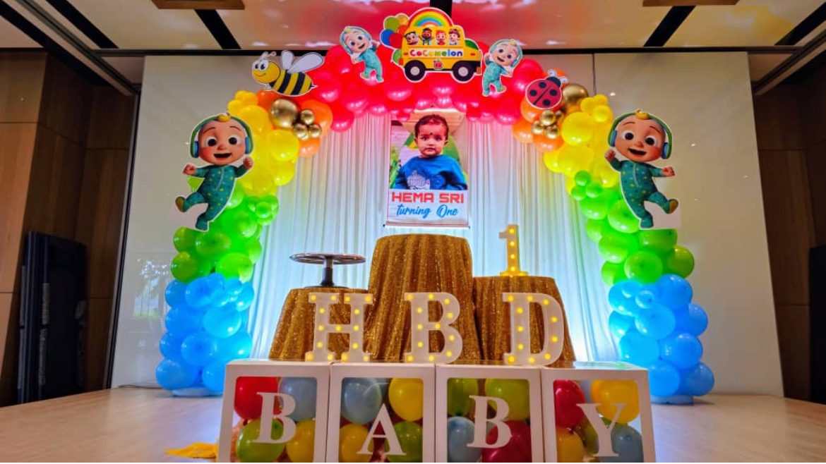Cocomelon-themed balloon arch
